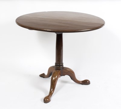 Lot 916 - A George III mahogany tilt top supper table,...