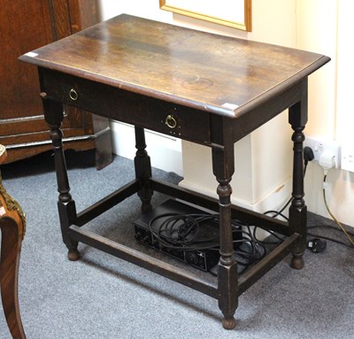 Lot 923 - An oak occasional table with single drawer,...