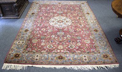 Lot 936 - An Indian rug, the central ivory ground...