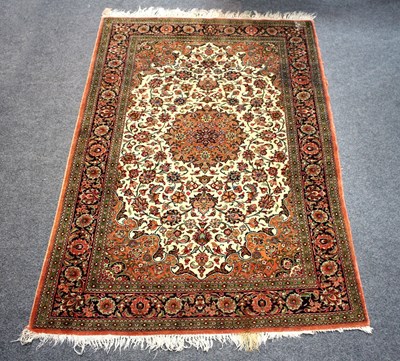 Lot 941 - An Isfahan rug with central medallion on a...