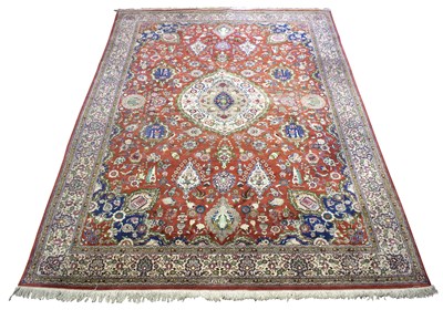 Lot 946 - An Isfahan carpet, the red and blue field with...