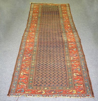 Lot 951 - A Malayir runner, the floral field to an...