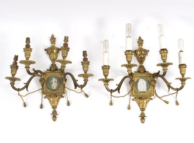 Lot 984 - A set of six four-branch gilt metal wall...