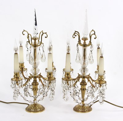 Lot 987 - A pair of four-branch table candelabra, each...