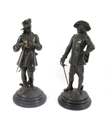 Lot 1000 - A pair of bronzed metal Cavalier type figures,...