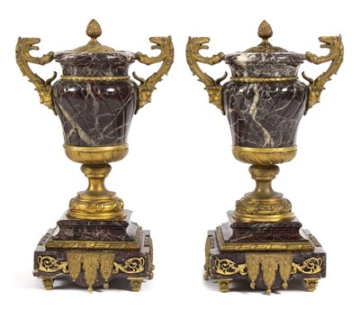 Lot 1009 - A pair of marble and gilt metal garniture...