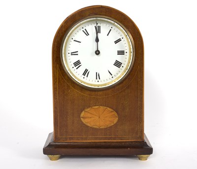 Lot 1020 - A mahogany arch top mantel clock inlaid an...