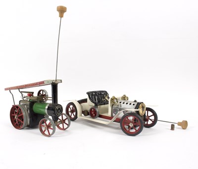 Lot 1082 - A Mamod steam car and a Mamod tractor engine...