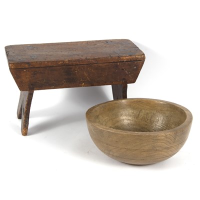 Lot 1085 - A small turned wood bowl and a stool