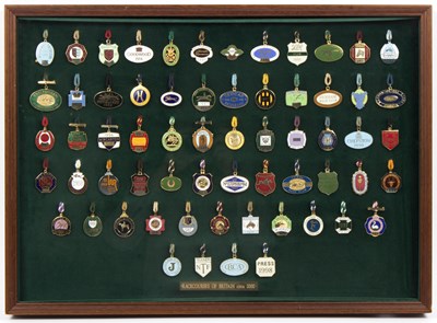 Lot 1086 - A collection of sixty-three enamel racing...