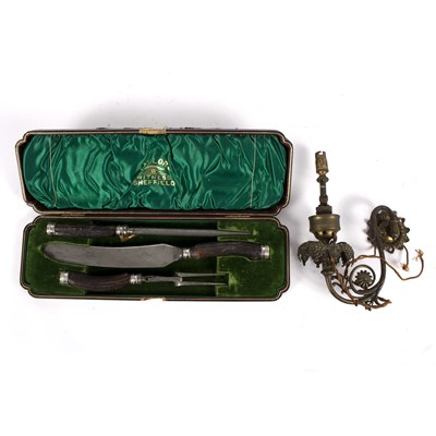 Lot 1088 - A carving knife, fork and steel with horn...