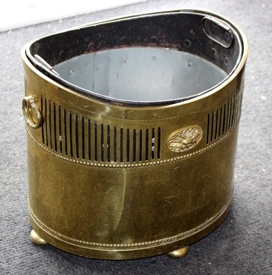 Lot 1093 - A brass coal scuttle of oval shape with...