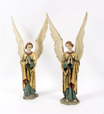 Lot 1096 - Two carved and painted figures of angels, 48cm...