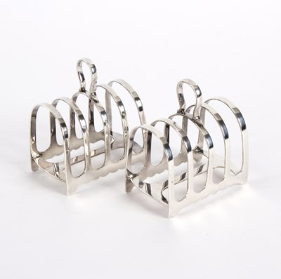 Lot 9 - A pair of silver toast racks, James Dixon &...