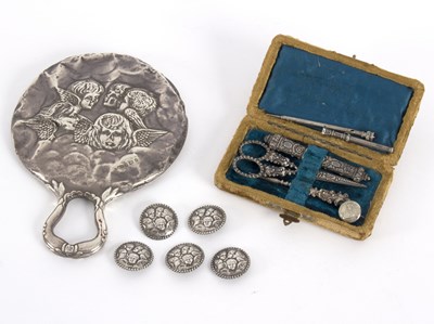 Lot 16 - A Victorian silver mounted hand mirror,...