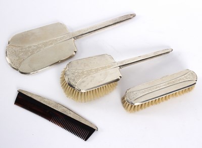 Lot 17 - A silver four-piece part dressing set, with...