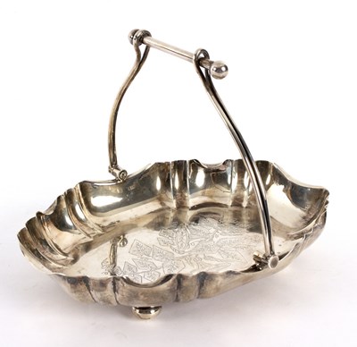 Lot 24 - A silver swing-handled dish, Walker & Hall,...