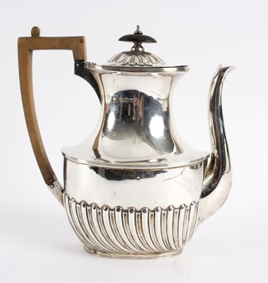 Lot 57 - A Victorian hot water jug, Sheffield 1888, of...