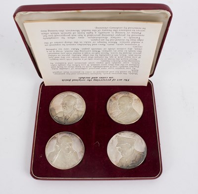 Lot 76 - A set of four silver Churchill Medals, limited...