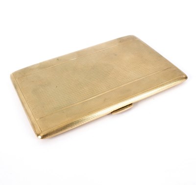 Lot 98 - A 9ct gold engine turned cigarette case, S and...