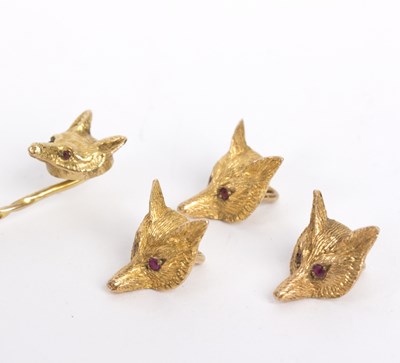 Lot 121 - A 9ct gold fox mask stick pin and three...