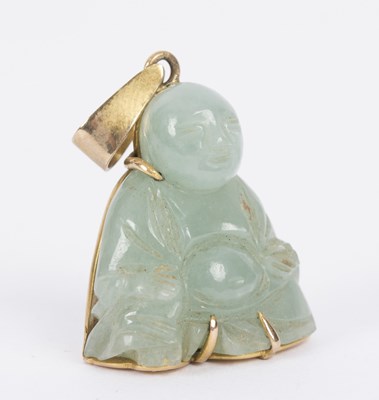 Lot 128 - A Chinese carved jade pendant, modelled as a...