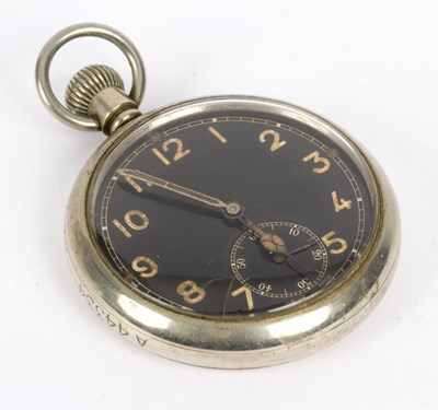 Lot 139 - A military open faced pocket watch, the black...