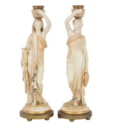 Lot 187 - A pair of Royal Worcester blush ivory...