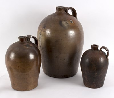 Lot 196 - A large brown glaze stoneware cider jar,...