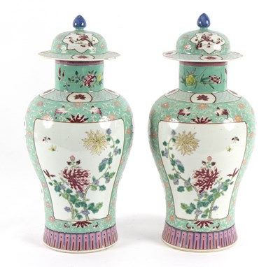 Lot 242 - A pair of Cantonese green ground vases with...