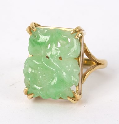 Lot 249 - A Chinese carved jadeite ring the rectangular...