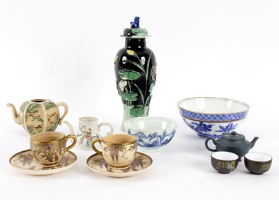 Lot 259 - A group of Oriental porcelain and pottery to...