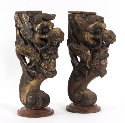 Lot 286 - A pair of Chinese painted and decorated dragon...