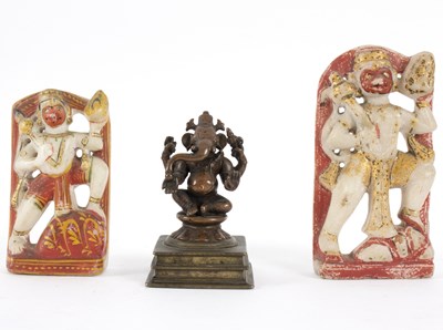 Lot 307 - A small Indian bronze figure of Ganesh on a...