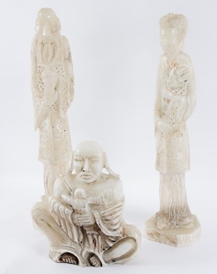 Lot 311 - Three white hardstone figures to include...