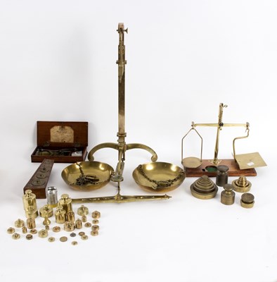 Lot 334 - A set of 19th Century brass weighing scales by...