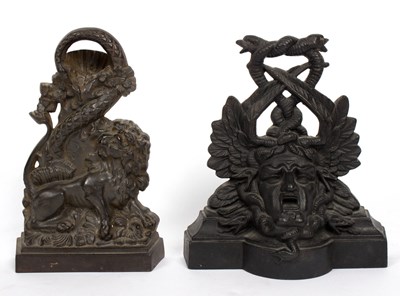 Lot 341 - A cast iron door stop in the form of a lion...