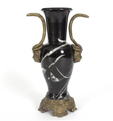 Lot 383 - A marble baluster urn in bronzed metal mounts...