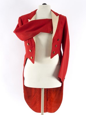 Lot 395 - A red hunting tail coat with buttons, possibly...