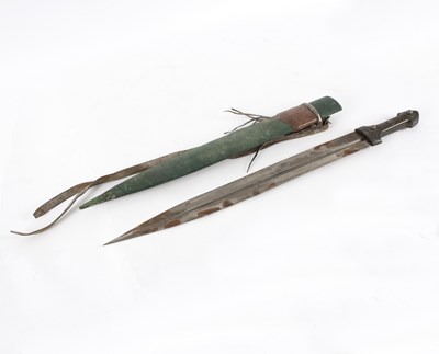 Lot 402 - A Sudanese sword, with leather mounted...