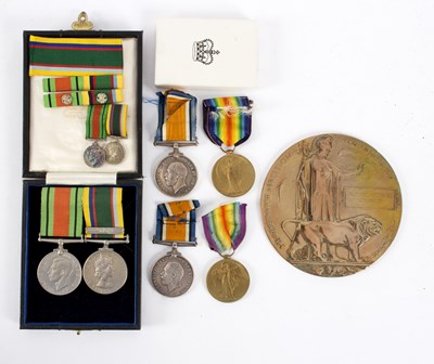 Lot 405 - A family group of medals comprising a World...