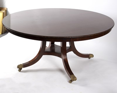 Lot 521 - A 20th Century mahogany Jupe type dining table...