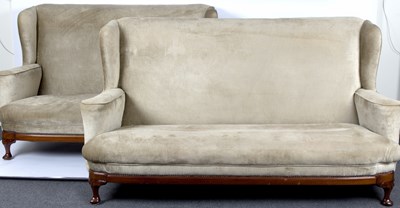 Lot 555 - A pair of modern two seater wingback settees