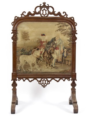 Lot 559 - A Victorian walnut framed fire screen, the...