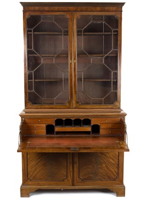 Lot 562 - A George III mahogany secretaire bookcase, the...