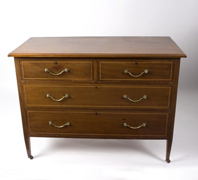 Lot 567 - An Edwardian mahogany chest of two short and...