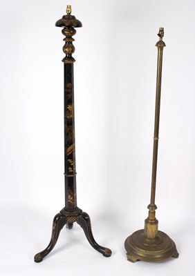 Lot 568 - A 1920s black japanned tripod standard lamp,...