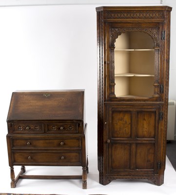 Lot 602 - An oak corner cupboard of Jacobean design, the...