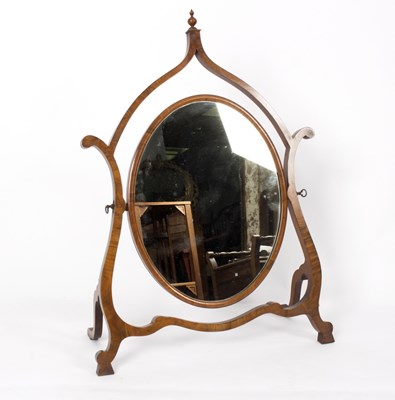 Lot 618 - A walnut framed dressing mirror with scrolling...