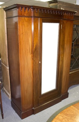 Lot 628 - An Edwardian mahogany wardrobe with mirror...